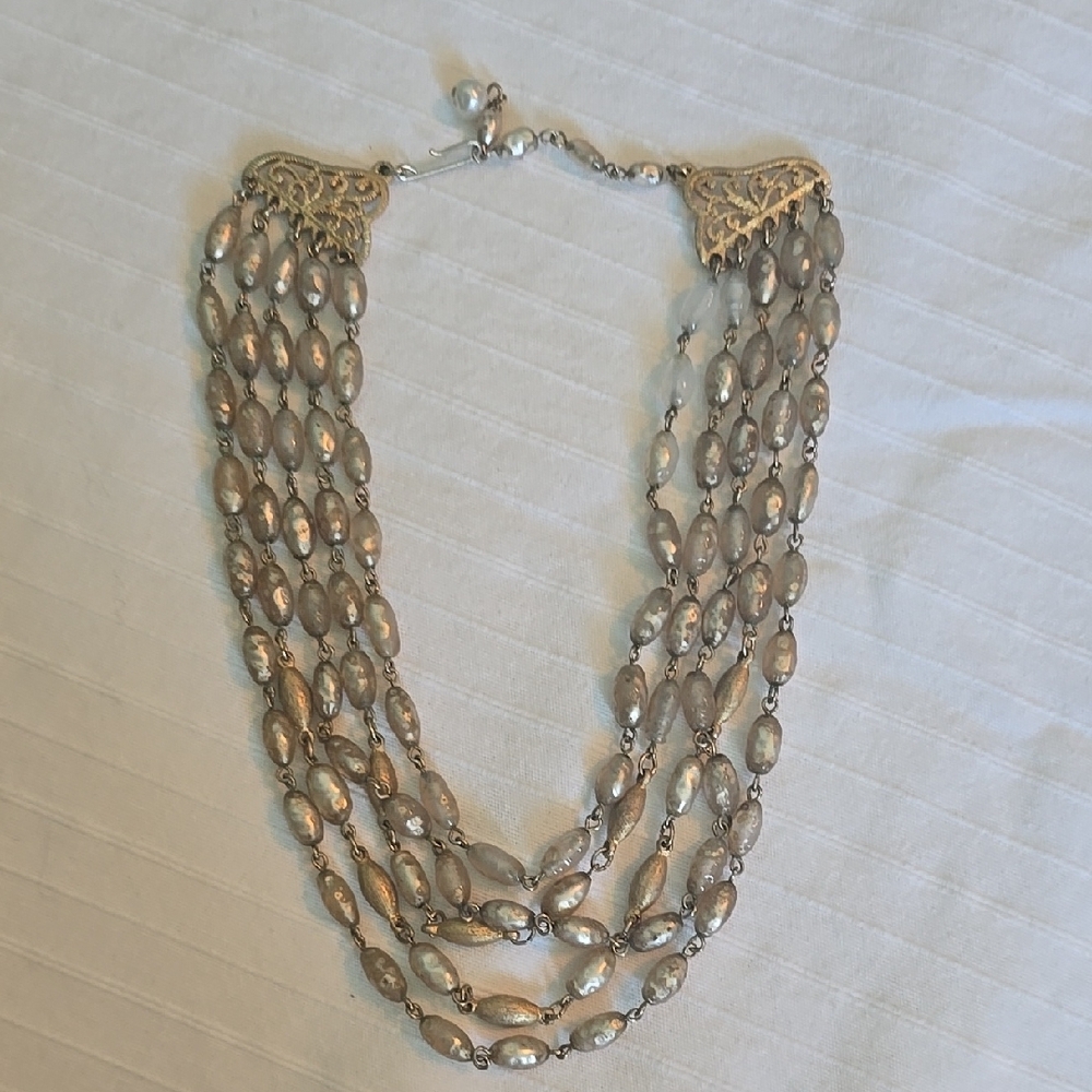 Elegant Silver and Gold Multi-Strand Necklace